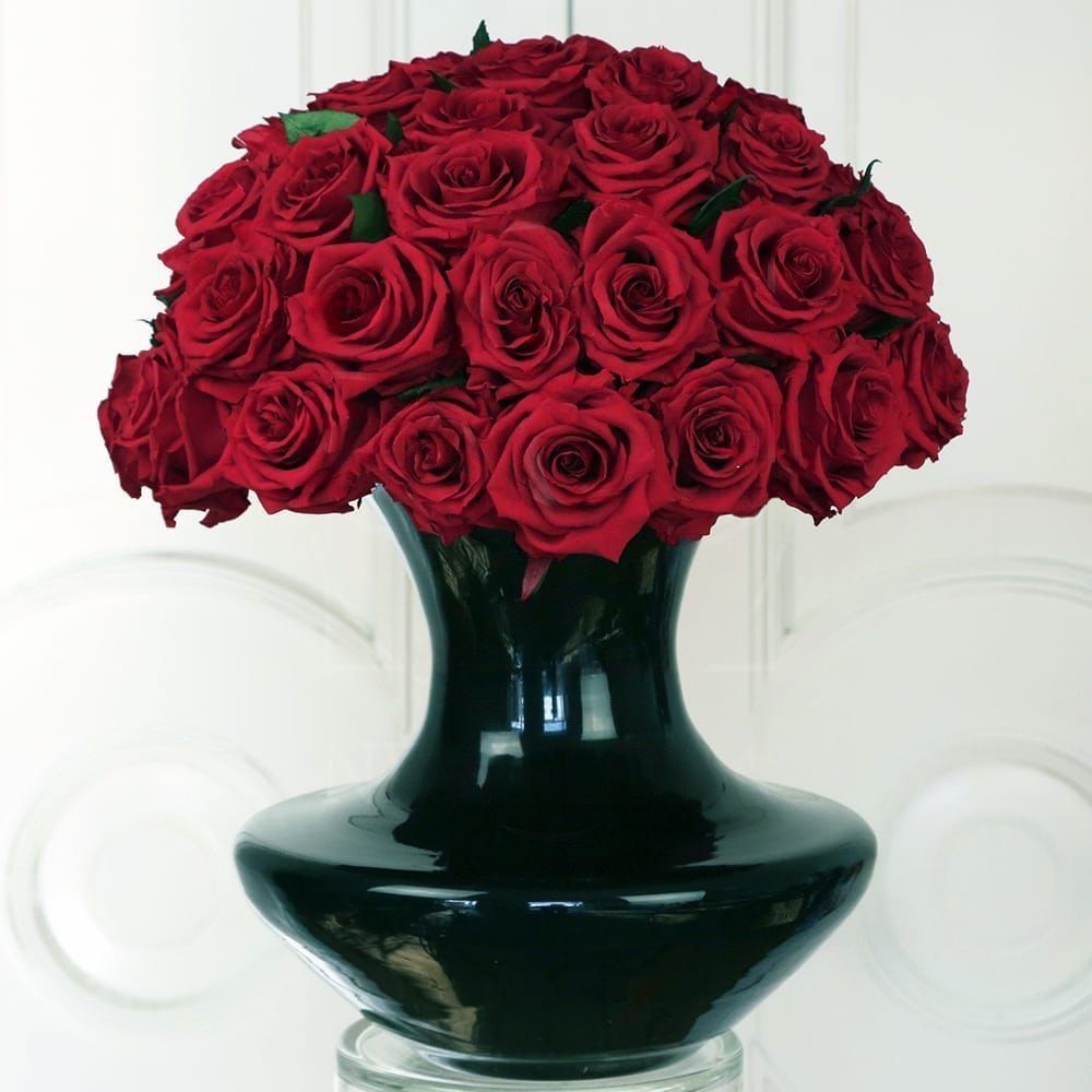 41 большая стабилизированная роза в вазе